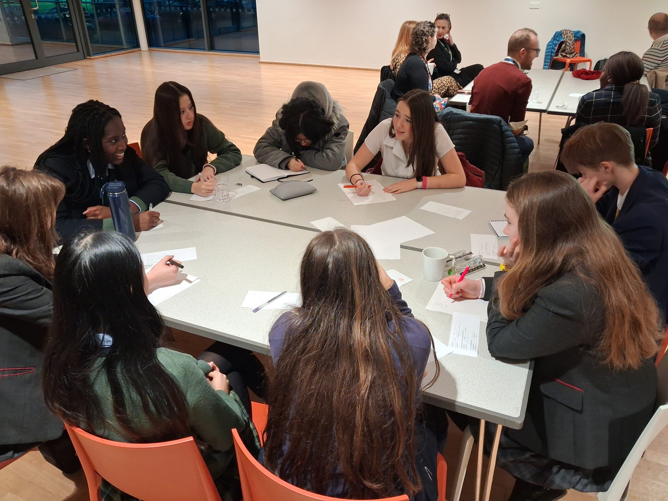 Group of students working together around a table